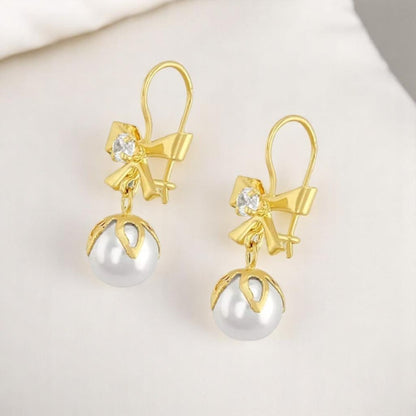 Arete Flor Moño Perla En Oro De 10 K + +